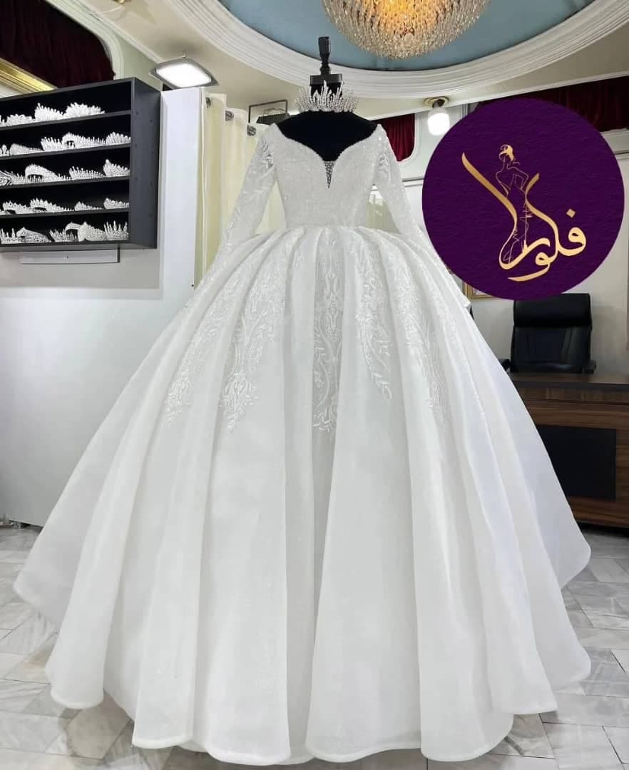 مزون لباس عقد و عروس فلورا در خوی