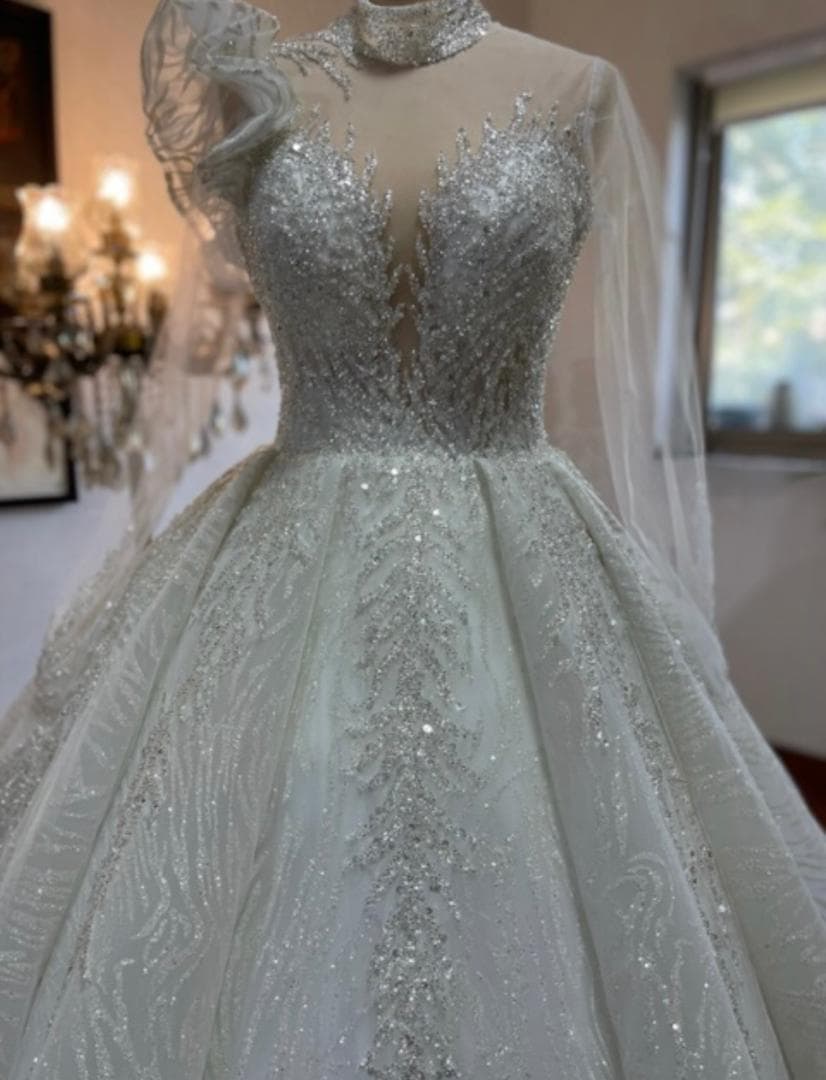 مزون و طراحی دوخت cip لباس شب عروس مجلسی کوئینک گتاب