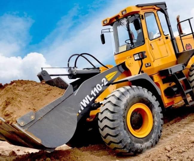 تعمیرات بیل مکانیکی و لودر کرمان هیدرولیک اقبالی در کرمان